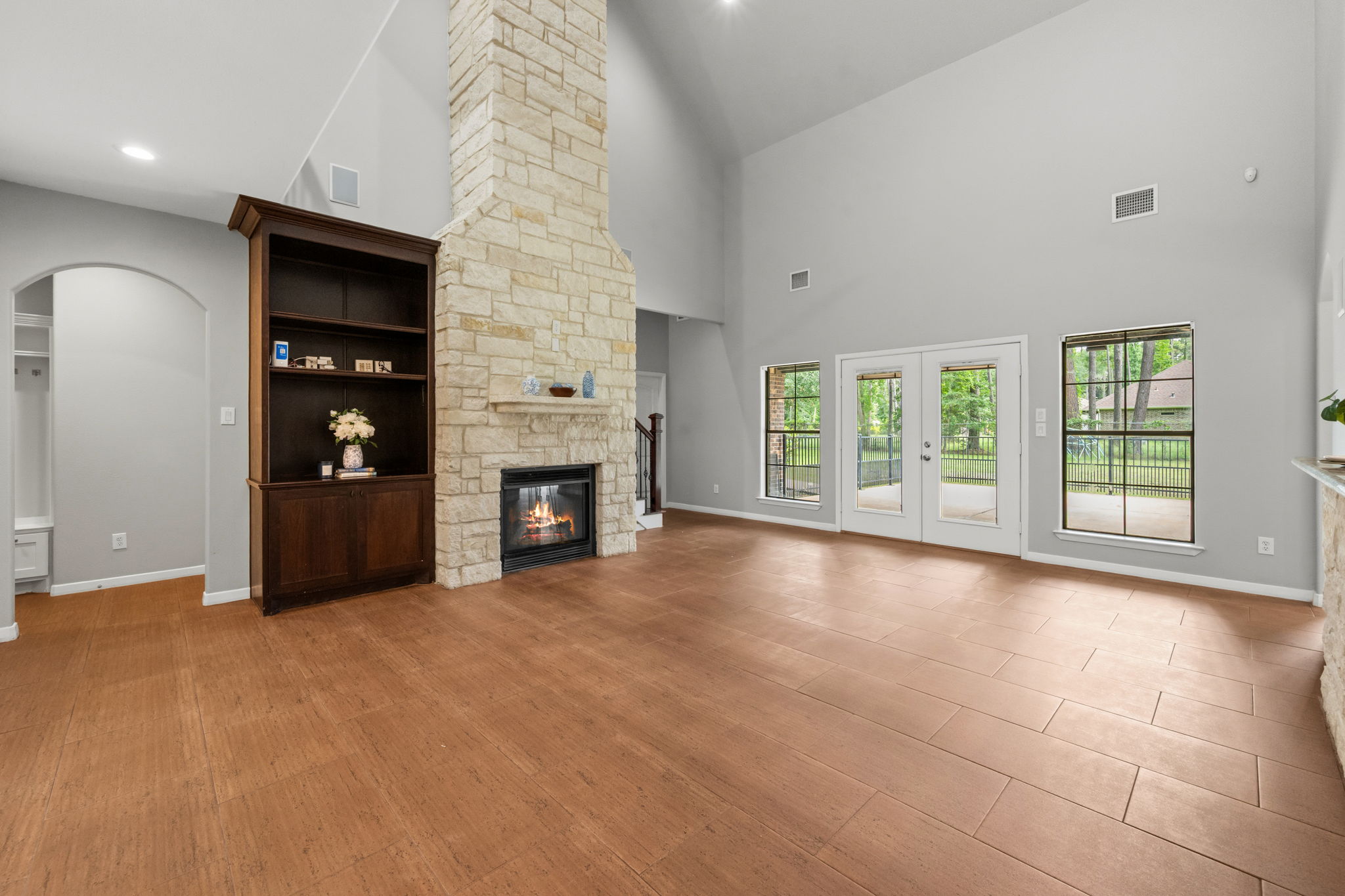 Empty great room before virtual staging